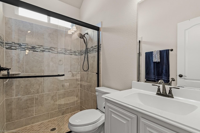 2139 Devonblue Dr, Forney, TX 75126 - full bath with a stall shower, toilet, vanity, and a textured wall