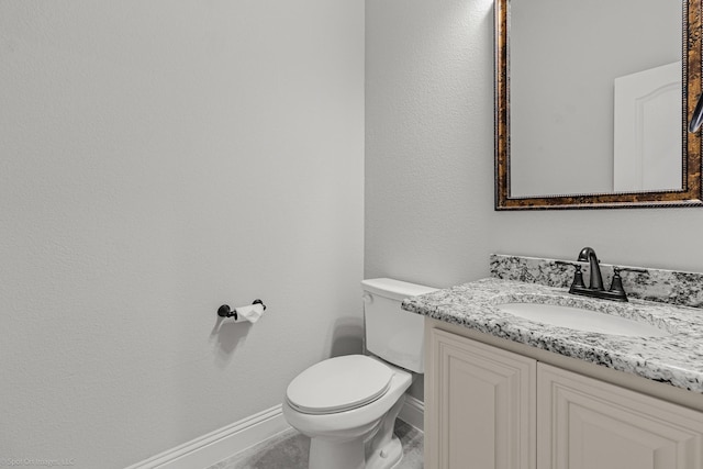2139 Devonblue Dr, Forney, TX 75126 - bathroom featuring baseboards, vanity, and toilet