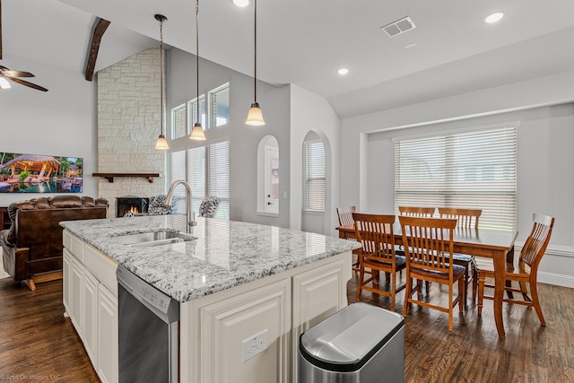 2139 Devonblue Dr, Forney, TX 75126 - kitchen with vaulted ceiling, a sink, stainless steel dishwasher, dark wood-style flooring, and ceiling fan