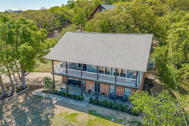 1096 Cedar Oak Dr, Pottsboro, TX 75076 - aerial view of property and surrounding area with a heavily wooded area