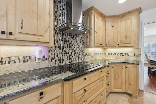 8820 Hunters Glen Trl, Fort Worth, TX 76120 - kitchen with light brown cabinetry, wall chimney exhaust hood, black electric stovetop, and recessed lighting