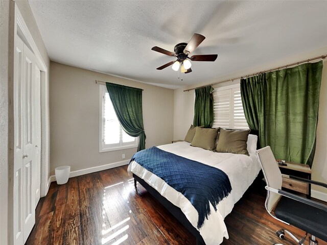 3127 Pastor St, Dallas, TX 75212 - bedroom with baseboards, wood finished floors, ceiling fan, and a closet