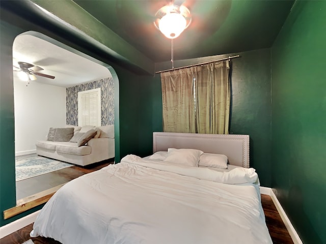 3127 Pastor St, Dallas, TX 75212 - bedroom featuring baseboards, wood finished floors, and a ceiling fan