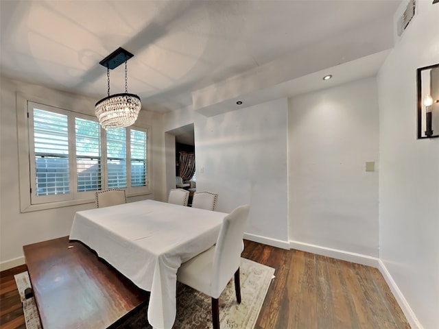3127 Pastor St, Dallas, TX 75212 - dining area featuring baseboards, dark wood-style floors, a chandelier, and recessed lighting
