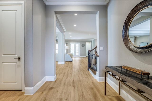 6009 Westchester Ln, Frisco, TX 75034 - corridor with crown molding, light wood-style floors, baseboards, stairs, and recessed lighting