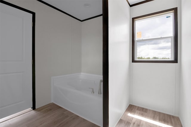 1203 Old Ida Rd, Sherman, TX 75090 - full bath featuring wood finished floors, a tub, and crown molding