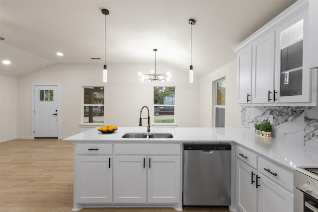 1832 Arch St, Fort Worth, TX 76105 - kitchen featuring dishwasher, a sink, vaulted ceiling, a peninsula, and range