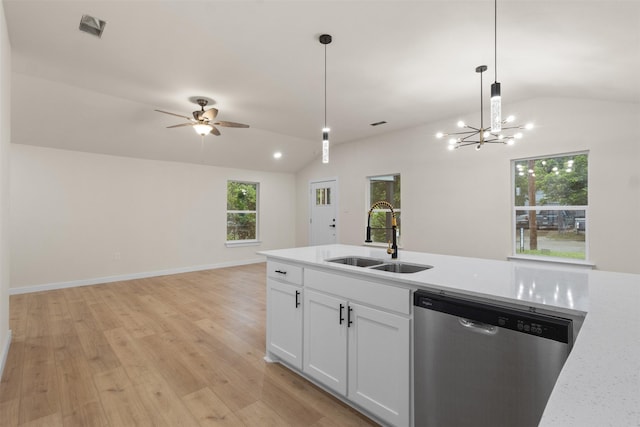 1832 Arch St, Fort Worth, TX 76105 - kitchen featuring stainless steel dishwasher, a sink, vaulted ceiling, open floor plan, and hanging light fixtures