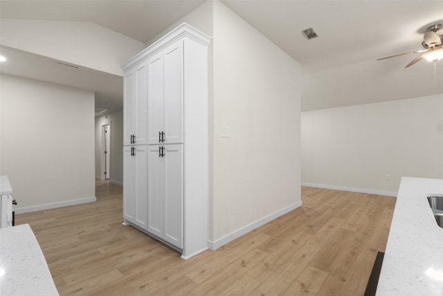 1832 Arch St, Fort Worth, TX 76105 - corridor with light wood-style flooring, vaulted ceiling, and baseboards
