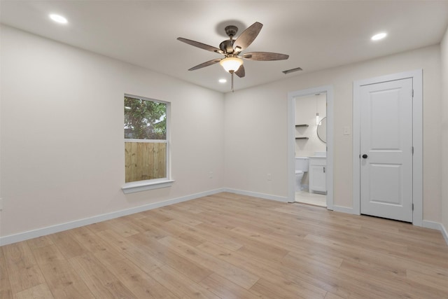 1832 Arch St, Fort Worth, TX 76105 - unfurnished bedroom featuring light wood-style floors, ensuite bathroom, recessed lighting, baseboards, and a ceiling fan