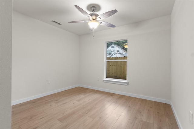 1832 Arch St, Fort Worth, TX 76105 - empty room featuring ceiling fan, light wood-type flooring, and baseboards
