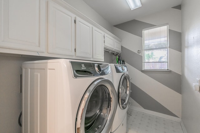415 Saddle Tree Trl, Coppell, TX 75019 - washroom featuring separate washer and dryer, light flooring, baseboards, and cabinet space