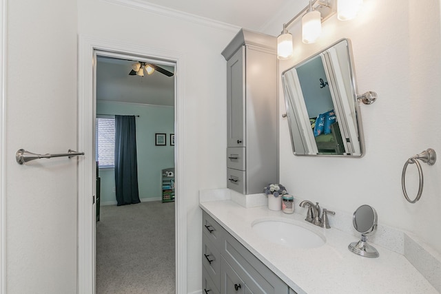 415 Saddle Tree Trl, Coppell, TX 75019 - bathroom with vanity, ornamental molding, and a ceiling fan