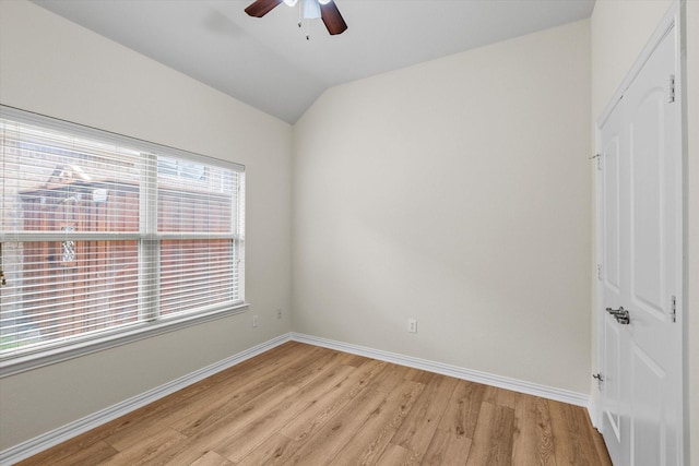 906 Cougar Dr, Allen, TX 75013 - empty room featuring a ceiling fan, light wood-style floors, lofted ceiling, and baseboards