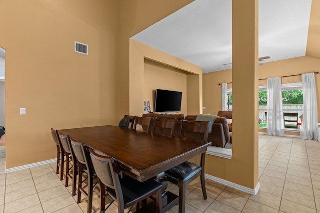 632 Shotwell St, Crowley, TX 76036 - dining room featuring light tile patterned flooring, baseboards, and vaulted ceiling