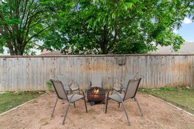 632 Shotwell St, Crowley, TX 76036 - fenced backyard featuring a fire pit