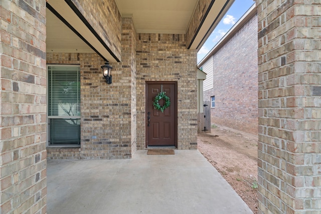 632 Shotwell St, Crowley, TX 76036 - doorway to property with brick siding