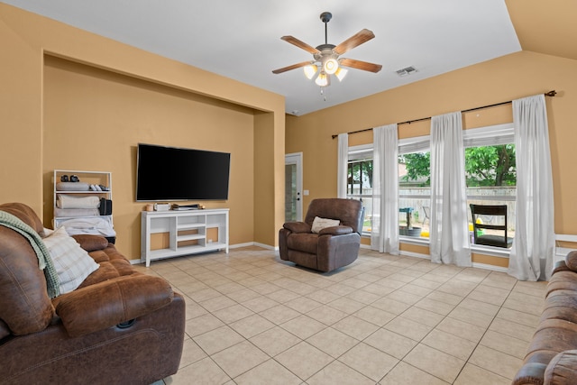 632 Shotwell St, Crowley, TX 76036 - living area with a ceiling fan, light tile patterned floors, vaulted ceiling, and baseboards
