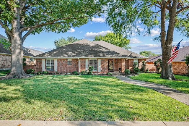4006 Thornhill Way, Rowlett, TX 75088 - view of front of property with a front lawn, brick siding, and a shingled roof