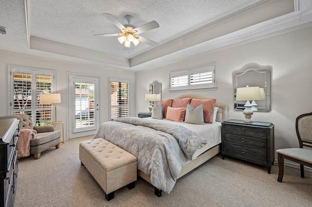 4006 Thornhill Way, Rowlett, TX 75088 - bedroom with crown molding, access to exterior, a raised ceiling, a textured ceiling, and light carpet