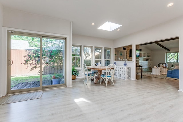 7403 Authon Dr, Dallas, TX 75248 - dining room with a skylight, wood finished floors, recessed lighting, and baseboards