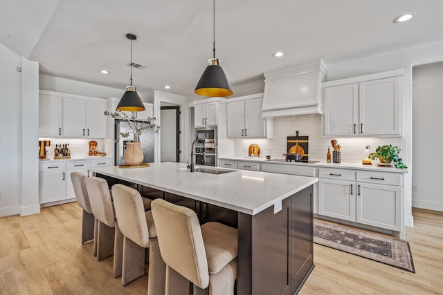5219 Old Dennis Rd, Weatherford, TX 76087 - kitchen featuring stainless steel appliances, a sink, tasteful backsplash, white cabinetry, and recessed lighting