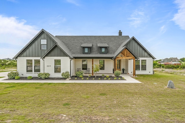 5219 Old Dennis Rd, Weatherford, TX 76087 - modern inspired farmhouse with board and batten siding, a chimney, brick siding, and a porch