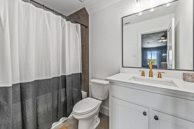 5219 Old Dennis Rd, Weatherford, TX 76087 - full bath with toilet, vanity, ceiling fan, shower / tub combo, and wood finished floors