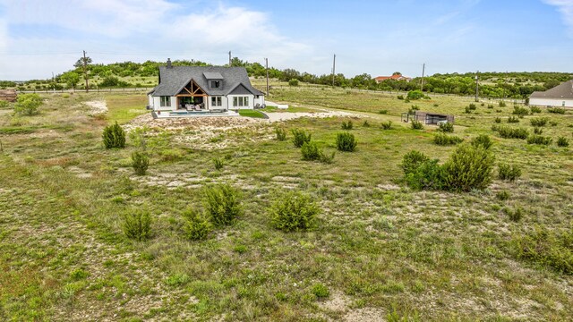 5219 Old Dennis Rd, Weatherford, TX 76087 - back of property featuring a view of countryside