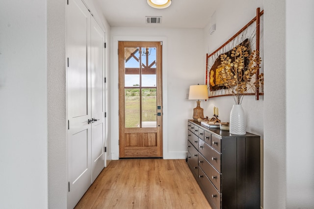5219 Old Dennis Rd, Weatherford, TX 76087 - entryway featuring light wood-type flooring and baseboards
