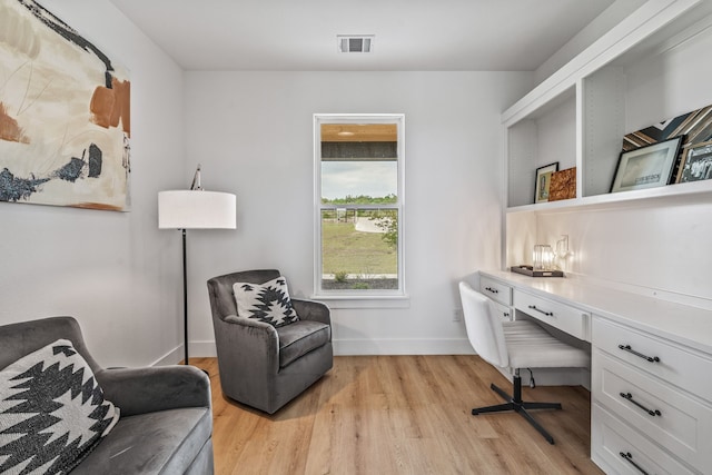 5219 Old Dennis Rd, Weatherford, TX 76087 - office space featuring built in desk, light wood-type flooring, and baseboards