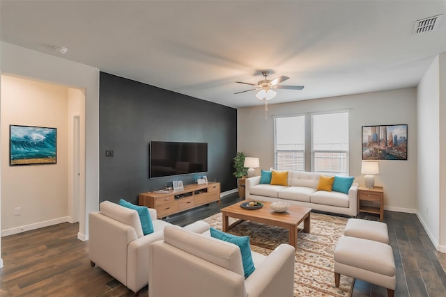136 Wagon Mound, Waxahachie, TX 75167 - living room with ceiling fan, baseboards, and dark wood finished floors