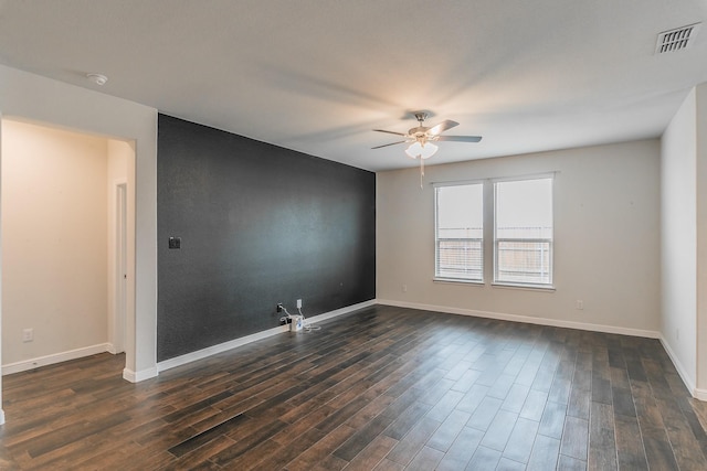 136 Wagon Mound, Waxahachie, TX 75167 - empty room featuring ceiling fan, dark wood-style floors, a smoke detector, and baseboards