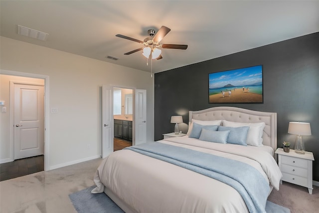 136 Wagon Mound, Waxahachie, TX 75167 - bedroom featuring baseboards, carpet flooring, and ensuite bathroom