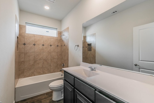 136 Wagon Mound, Waxahachie, TX 75167 - full bath featuring wood finished floors, bathtub / shower combination, toilet, and vanity