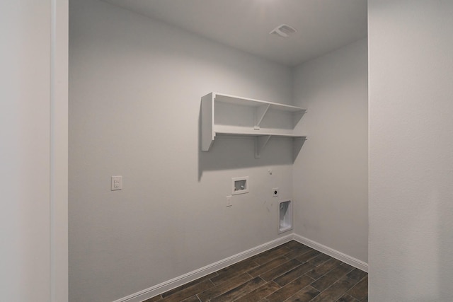 136 Wagon Mound, Waxahachie, TX 75167 - washroom with hookup for an electric dryer, hookup for a washing machine, baseboards, dark wood-style floors, and hookup for a gas dryer