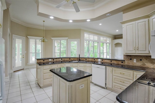 7712 Ravenswood Rd, Granbury, TX 76049 - kitchen featuring dishwasher, a sink, light tile patterned floors, recessed lighting, and a center island
