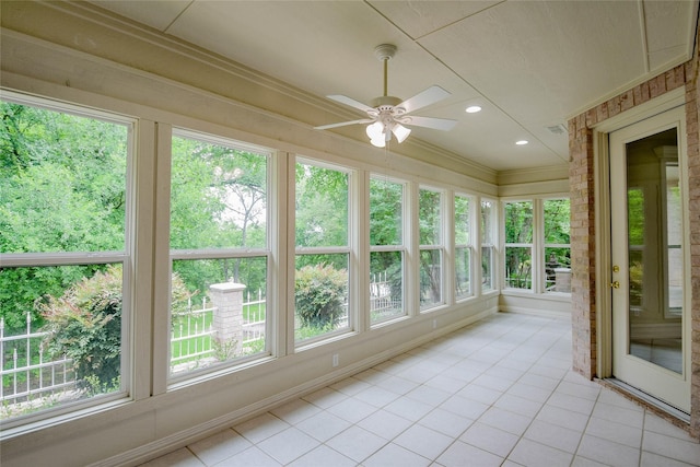 7712 Ravenswood Rd, Granbury, TX 76049 - unfurnished sunroom with tile patterned floors, recessed lighting, and crown molding