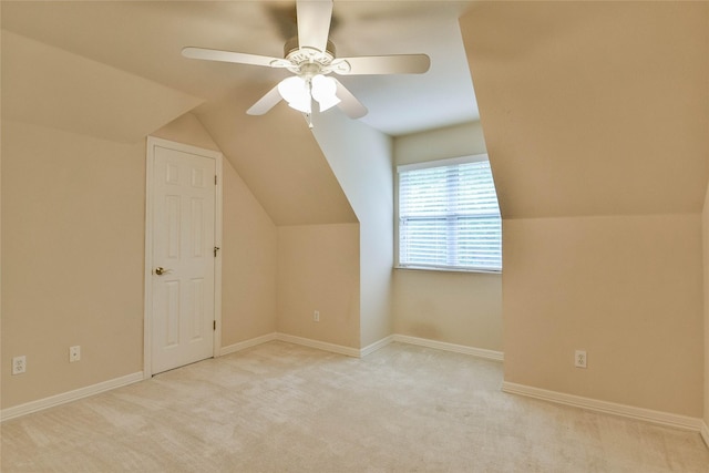 7712 Ravenswood Rd, Granbury, TX 76049 - additional living space with lofted ceiling, a ceiling fan, carpet floors, and baseboards