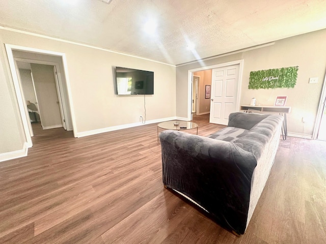 living area featuring wood finished floors and baseboards