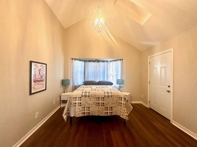 bedroom with a chandelier, wood finished floors, baseboards, and high vaulted ceiling