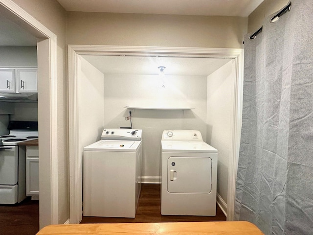 laundry room featuring independent washer and dryer and dark wood-style flooring