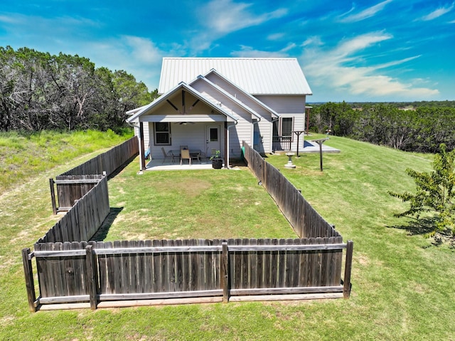 2807 Wind Point Ct, Tolar, TX 76476 - rear view of house with ceiling fan, a patio, and metal roof