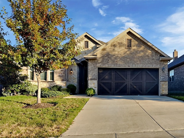 5116 Stockwhip Dr, Fort Worth, TX 76036 - view of front of home featuring stone siding, an attached garage, and concrete driveway