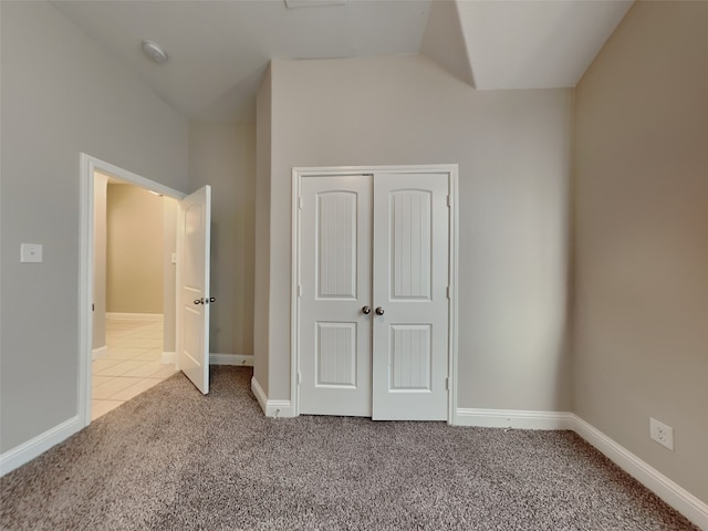 5116 Stockwhip Dr, Fort Worth, TX 76036 - unfurnished bedroom featuring carpet, vaulted ceiling, a closet, and baseboards