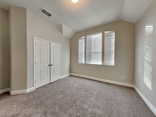 5116 Stockwhip Dr, Fort Worth, TX 76036 - unfurnished bedroom with carpet floors, vaulted ceiling, baseboards, and a closet
