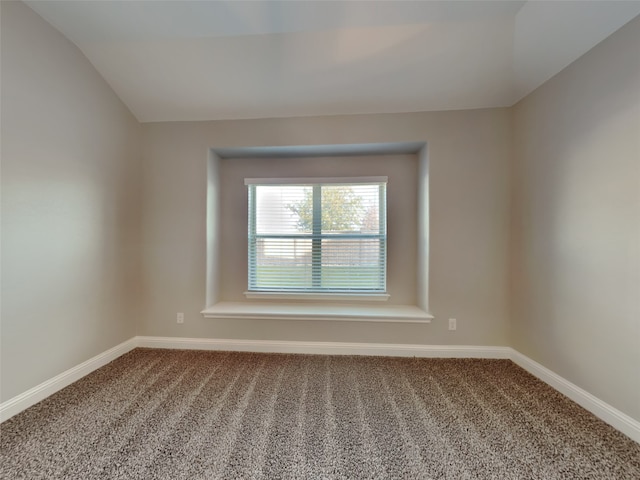 5116 Stockwhip Dr, Fort Worth, TX 76036 - spare room featuring carpet, baseboards, and vaulted ceiling