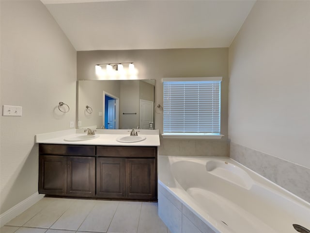 5116 Stockwhip Dr, Fort Worth, TX 76036 - bathroom featuring a garden tub, double vanity, and tile patterned flooring