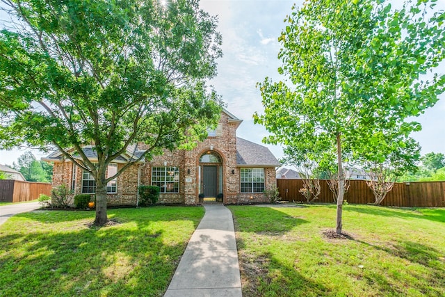 318 Mesquite Ct, Murphy, TX 75094 - traditional-style home featuring brick siding