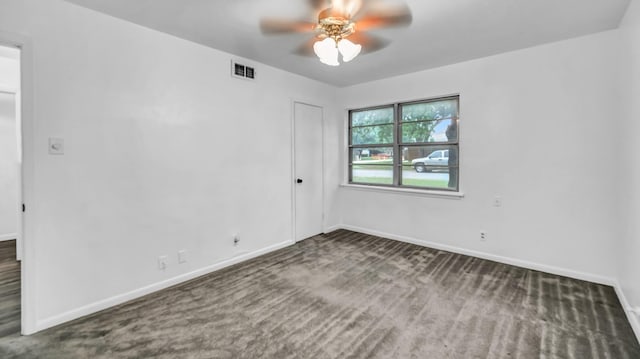 100 Oakhurst Dr, Hurst, TX 76053 - carpeted empty room with baseboards and ceiling fan